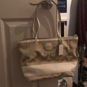 Tan and cream Coach tote purse